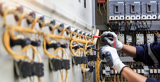 Professional Electrician technician working in Winooski, VT